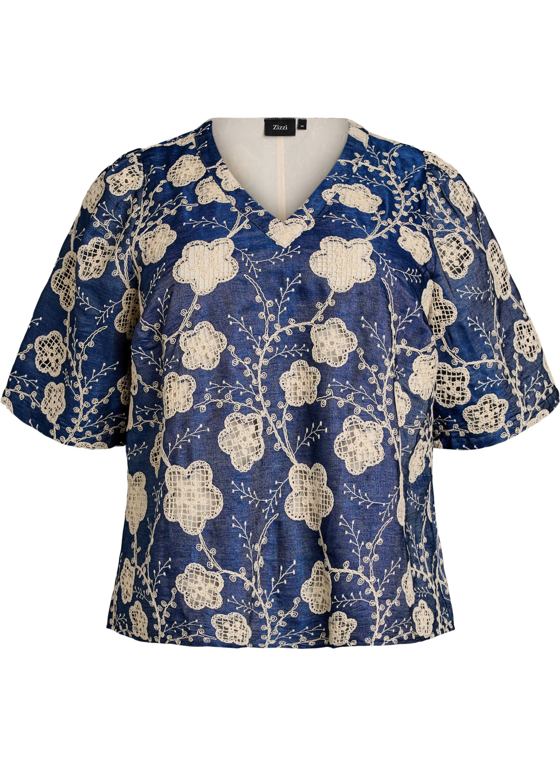 Blouse avec col en V et motif brod&eacute;