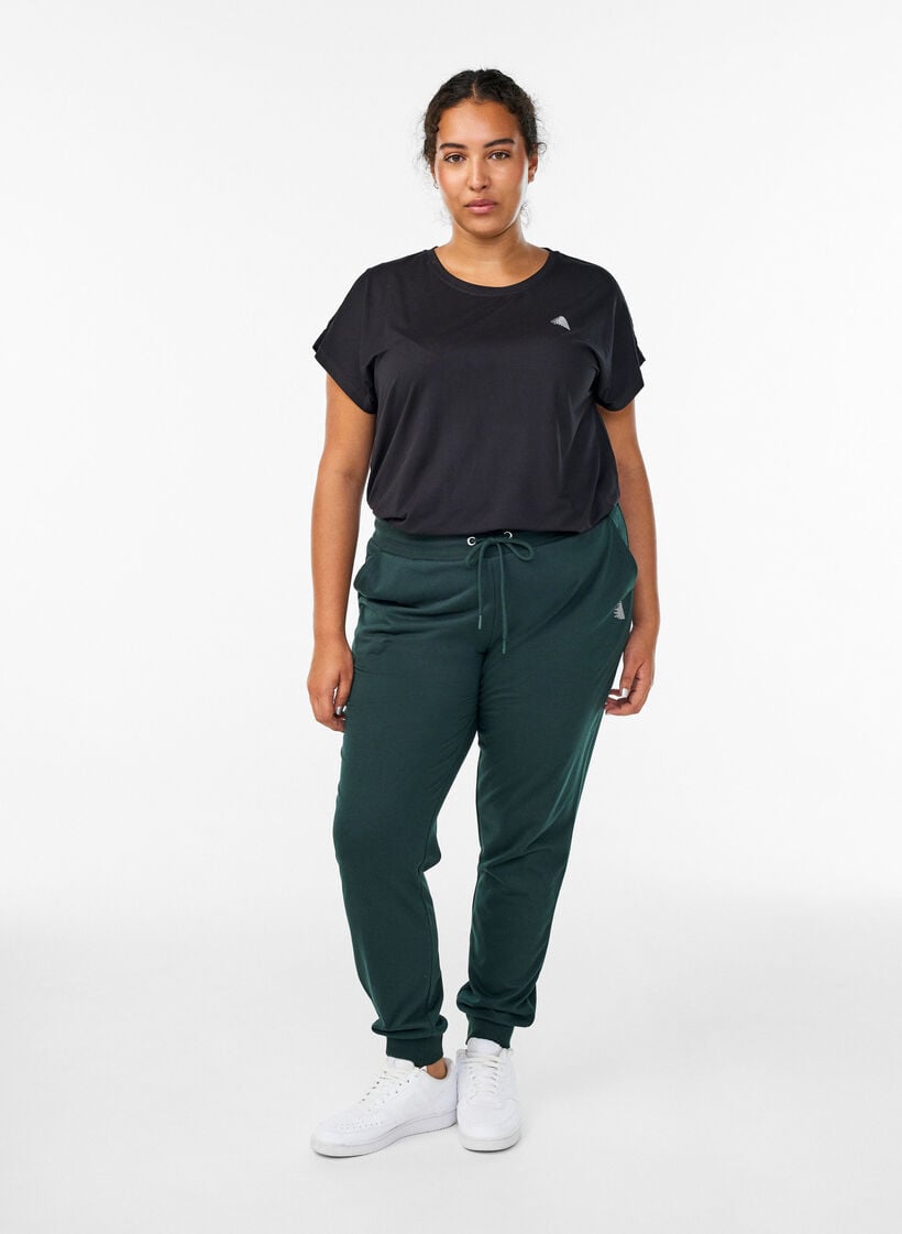 Pantalon de surv&ecirc;tement ample avec poches, Vert fonc&eacute;, Model image number 0