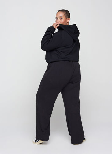 Pantalon de jogging avec largeur et cordon de serrage à la taille, Black, Model image number 1