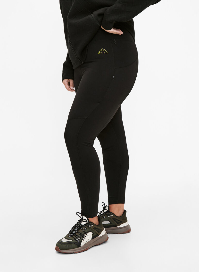 Rekbare en duurzame trainingleggings met zakken, Black, Model image number 0
