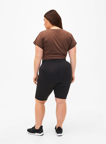 Nauwsluitende training shorts met zakken, Black, Model image number 1