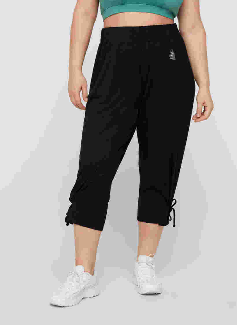 Pantalon de sport de viscose longueur 3/4, Black, Model image number 0