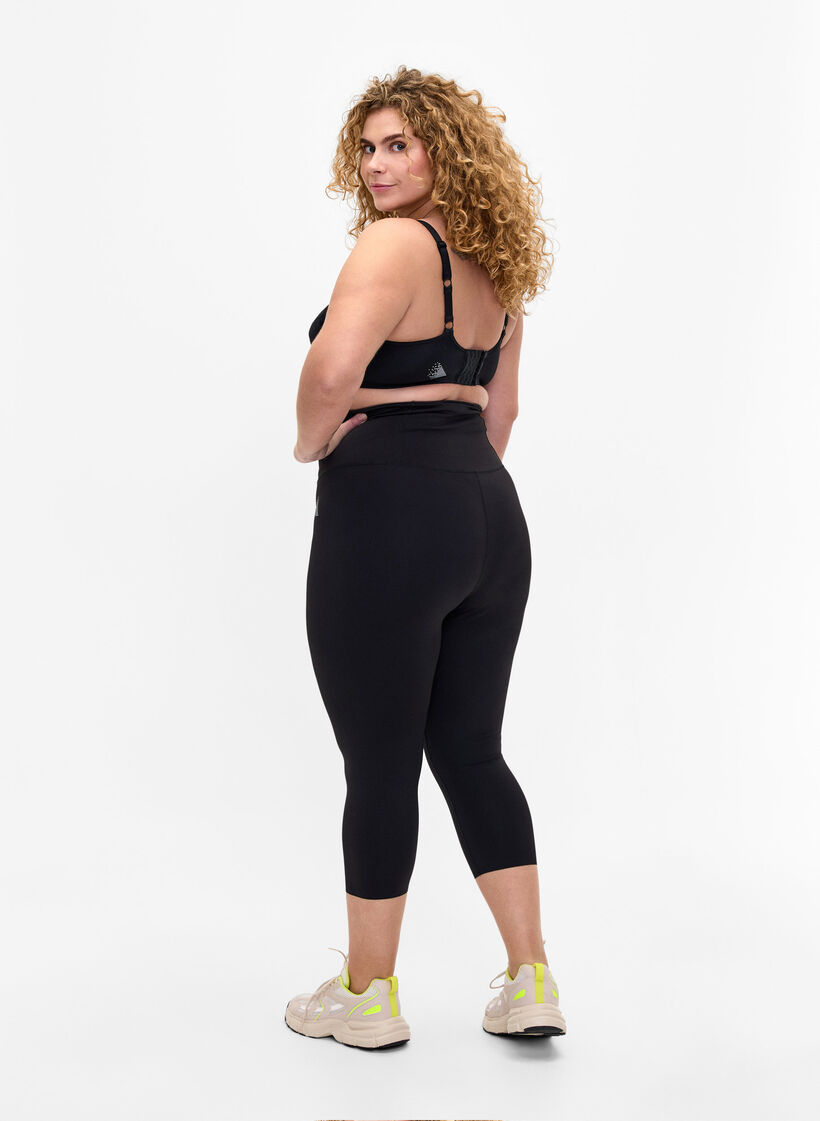 CORE, SUPER TENSION TIGHTS - 3/4 sportlegging met zakje, Black, Model image number 1