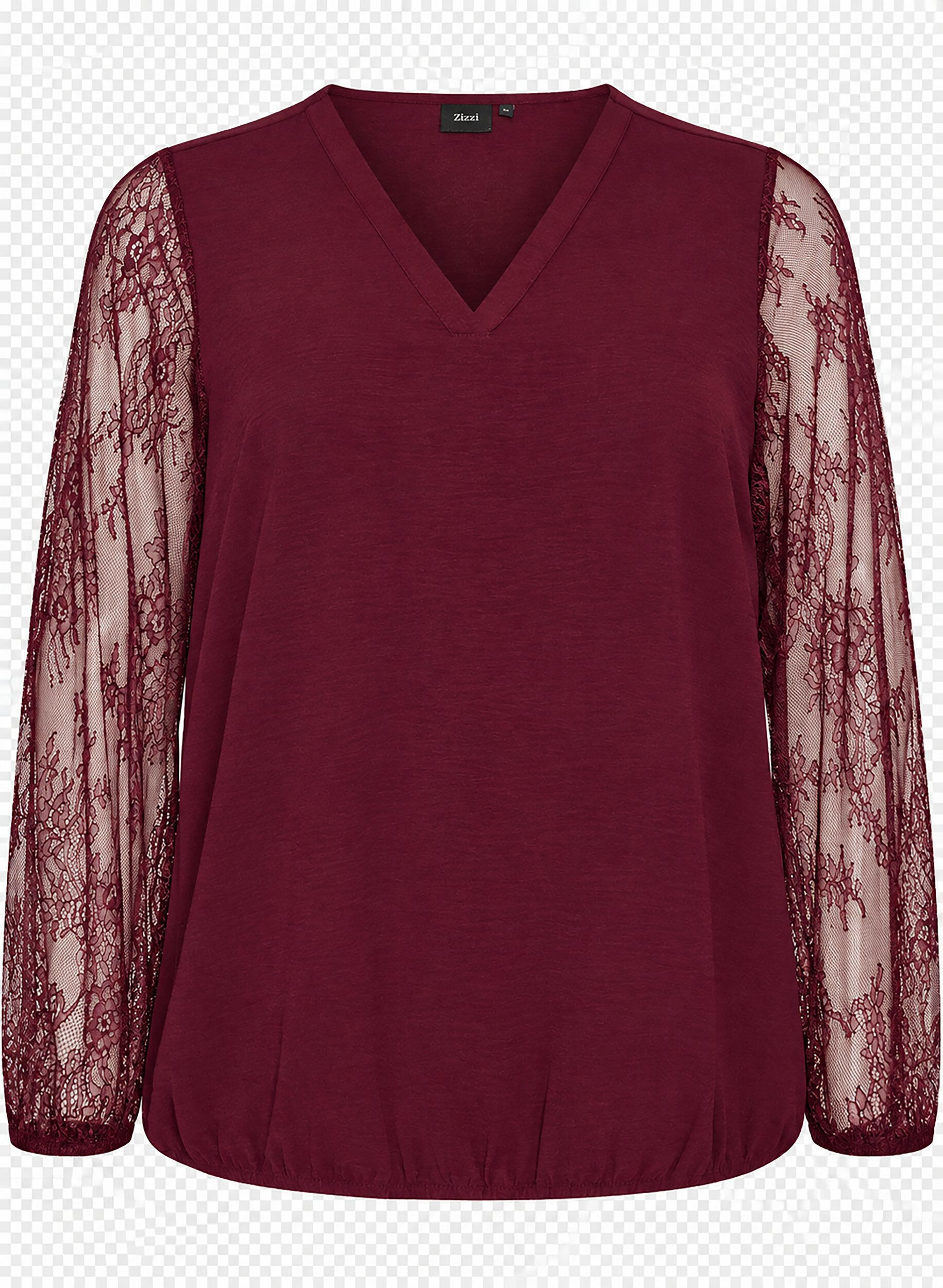 Blouse avec manches en dentelle et coupe ballon