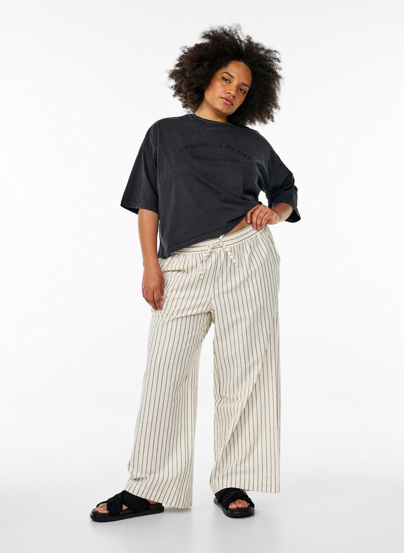 Pantalon ample avec taille haute et poches, Vanille, Model image number 0