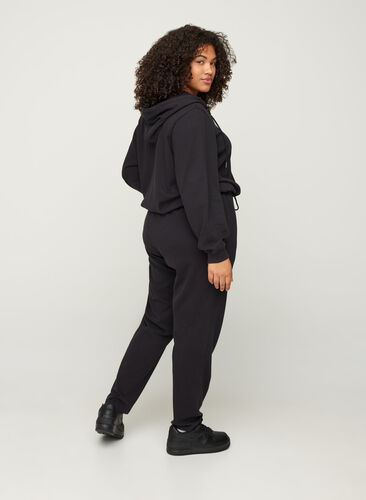 Pantalon de jogging ample en 100% coton, Black, Model image number 0
