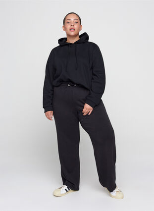Pantalon de jogging avec largeur et cordon de serrage à la taille, Black, Model image number 0