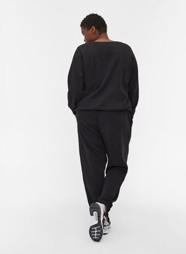 Pantalon de jogging ample avec des poches, Black, Model image number 1
