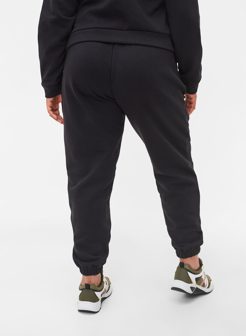 Pantalon ample en coton avec poches, Noir, Model image number 1