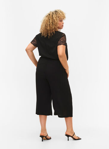 Pantalon ample en viscose, Black, Model image number 1