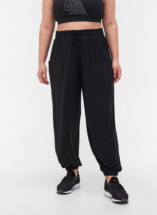 Pantalon d'entraînement ample avec poches en viscose, Black, Model image number 0
