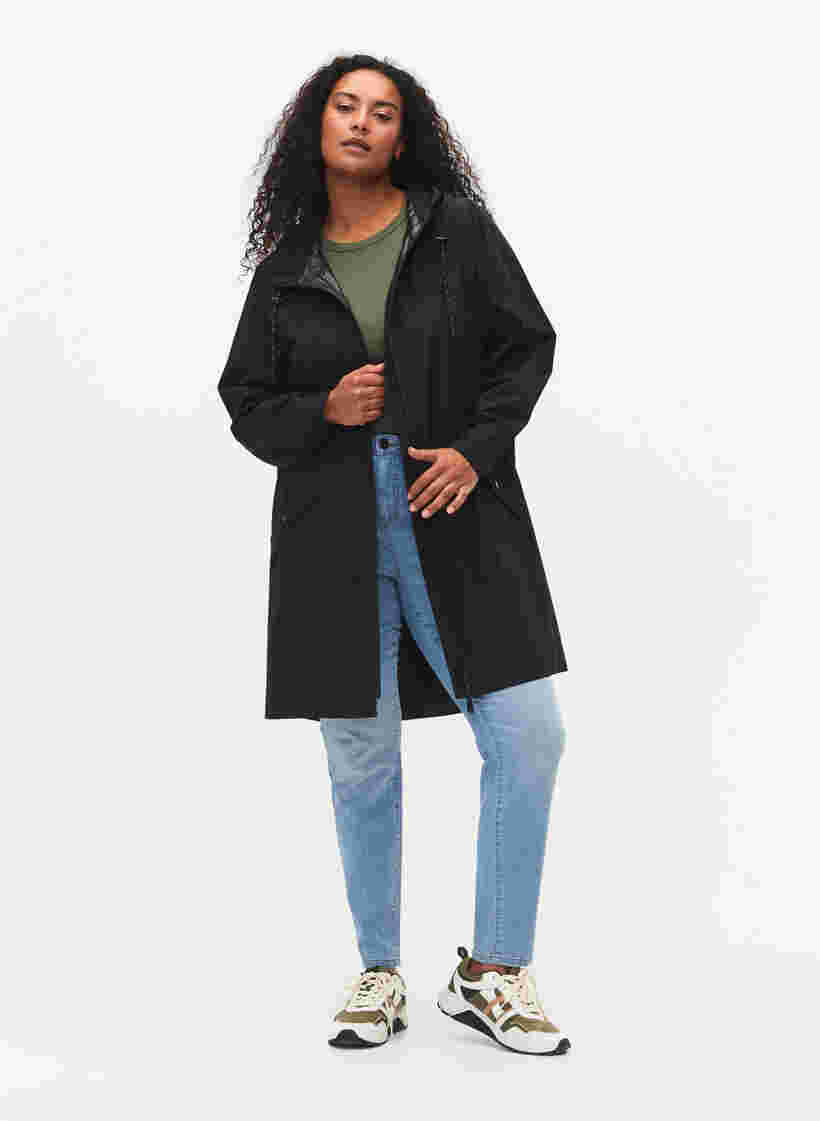 Regenjas met zakken en capuchon, Black, Model image number 2