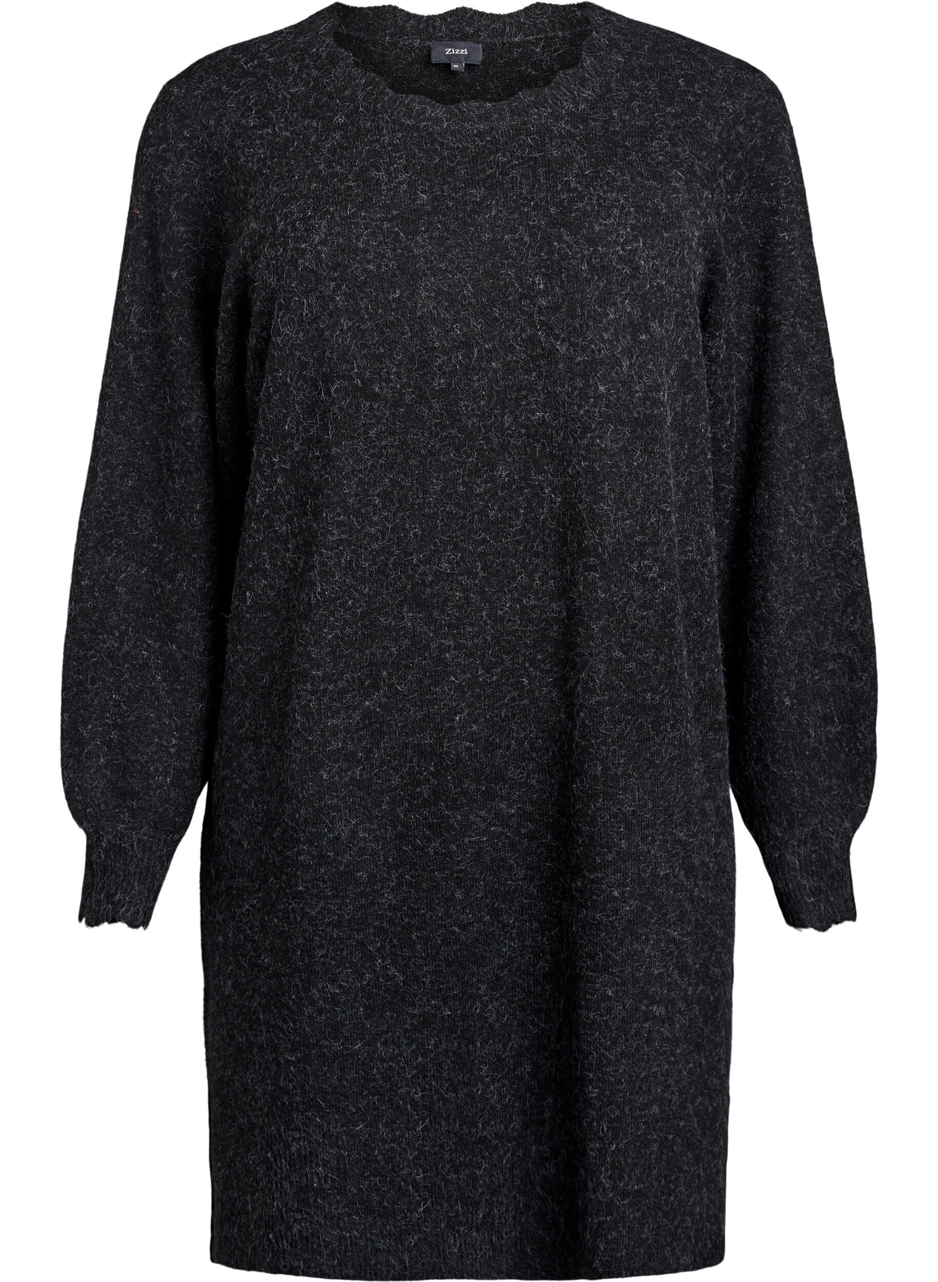 Korte gebreide jurk met golvende zoom en splitjes