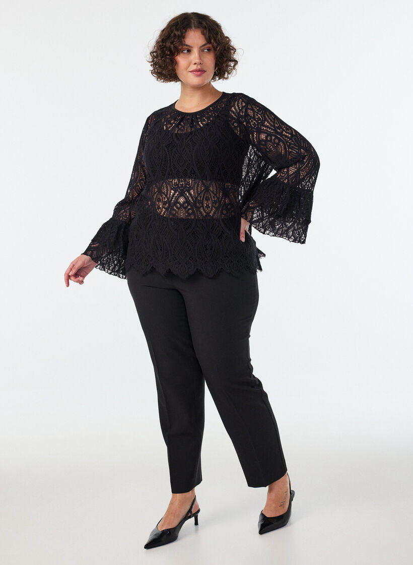 Blouse en dentelle avec manches longues trompette et volants, Noir, Model image number 1