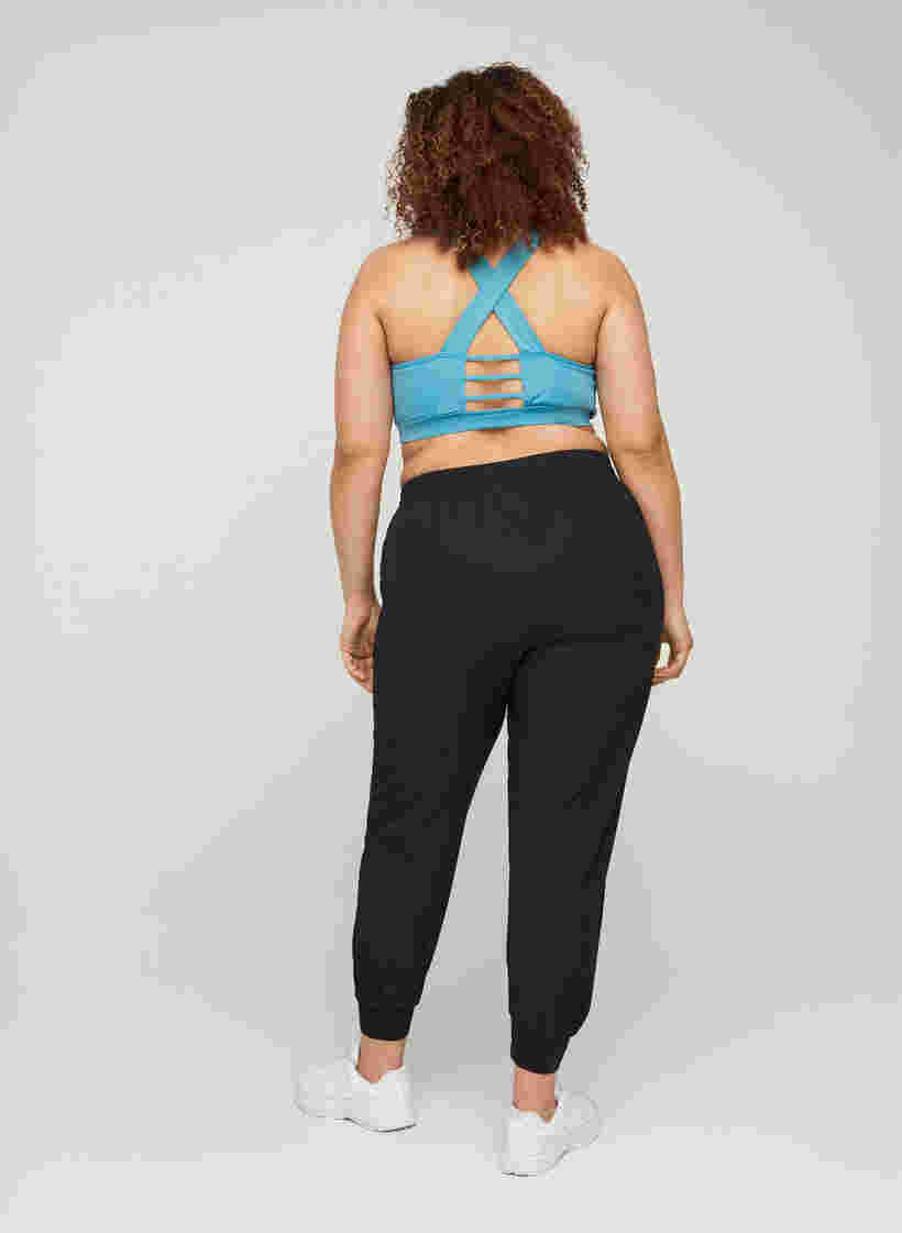 Pantalon d'entraînement ample avec poches, Black, Model image number 1