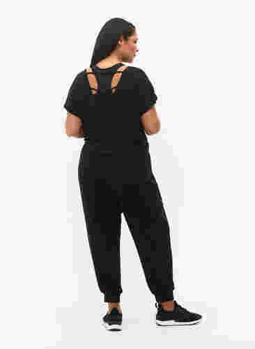 Pantalon de survêtement avec poches, Black, Model image number 1