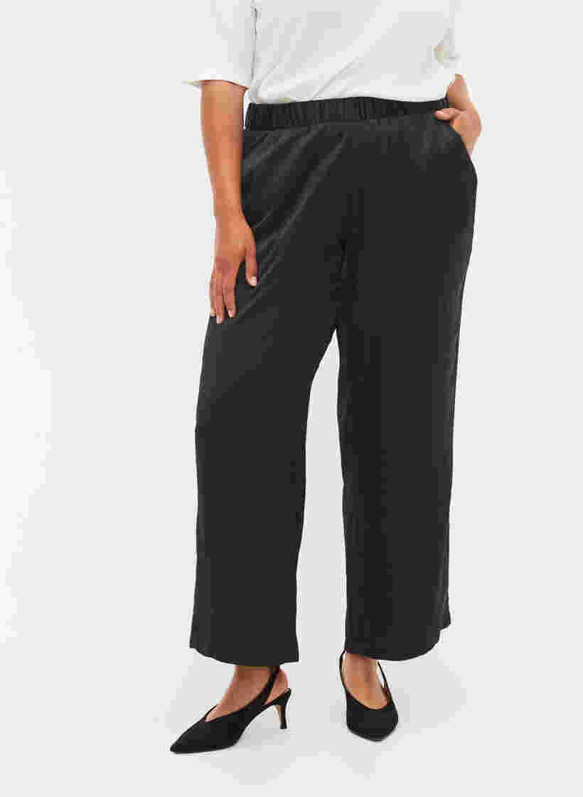 Pantalon ample avec poches et bord élastiqué, Black, Model image number 2