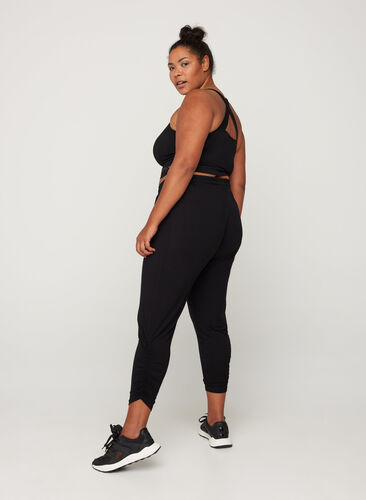 Pantalon de fitness ample en viscose, Black, Model image number 0