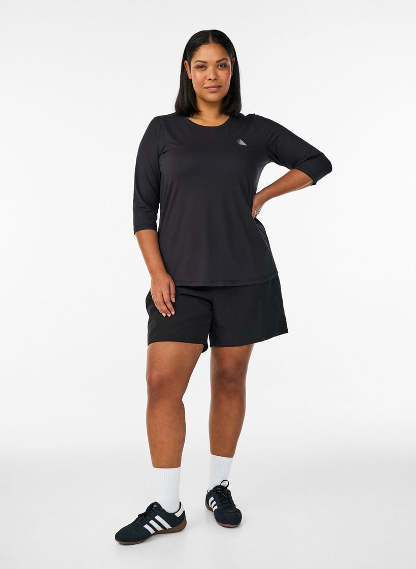 Blouse d'entra&icirc;nement &agrave; manches 3/4, Noir, Model image number 1