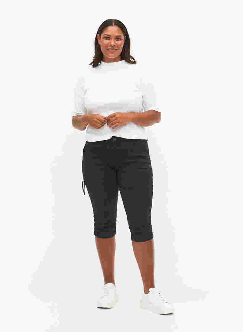 Jean capri coupe slim avec poches, Black, Model image number 0