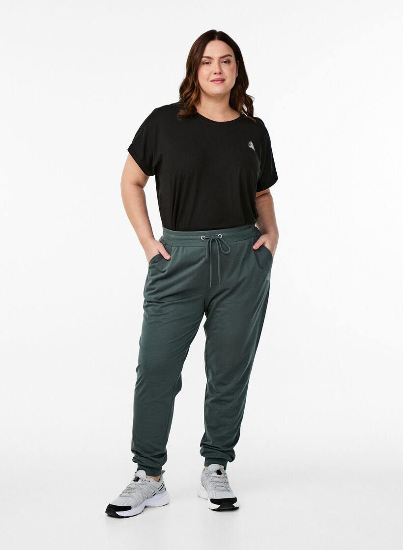 Pantalon de surv&ecirc;tement ample avec poches, Vert fonc&eacute;, Model image number 0