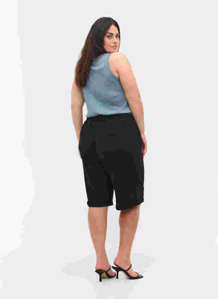 Short met elastische rand en zakken, Black, Model