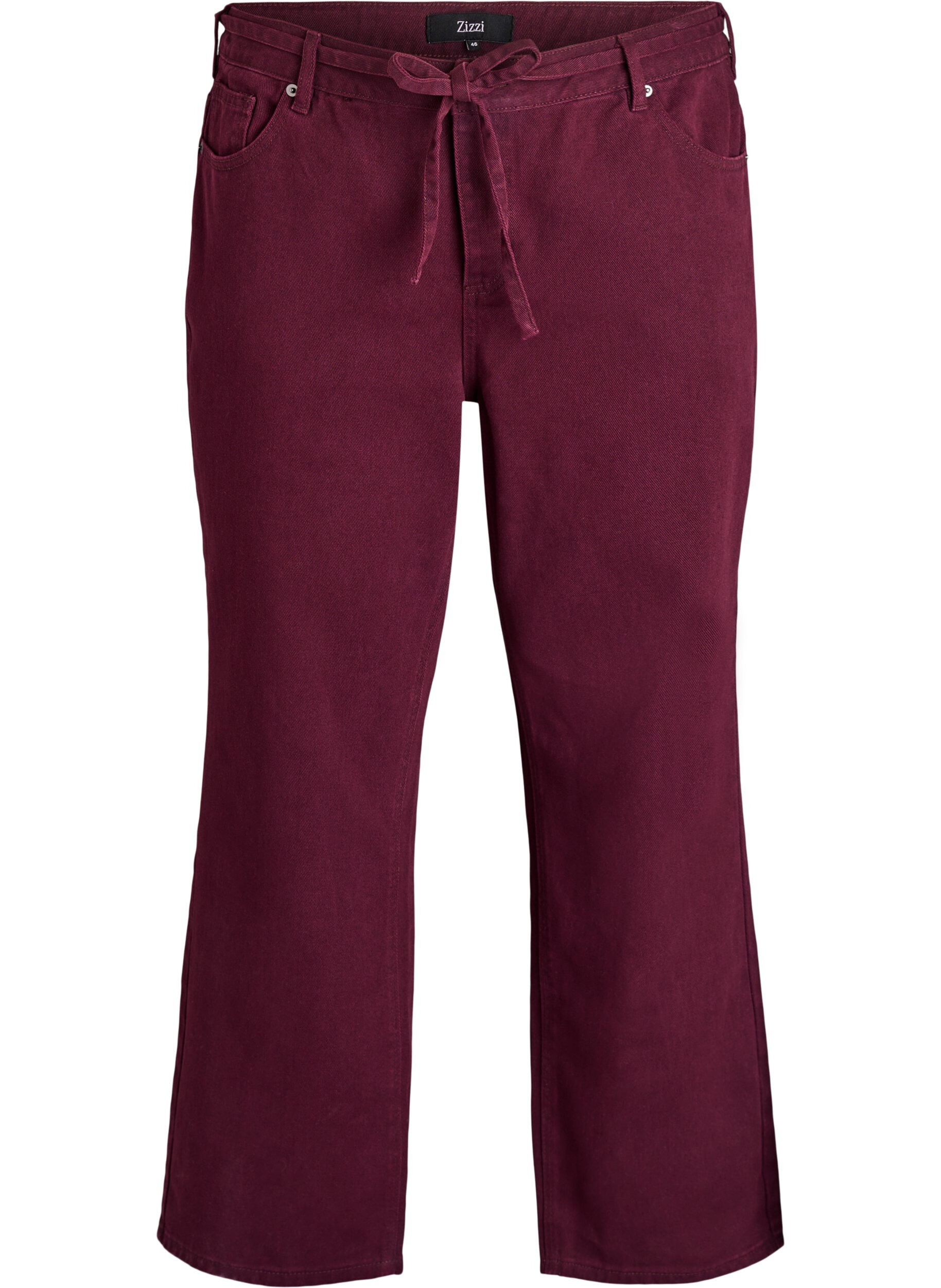 Gekleurde high-waist jeans met een strikceintuur