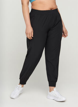 Pantalon d'entraînement ample avec poches, Black, Model image number 0