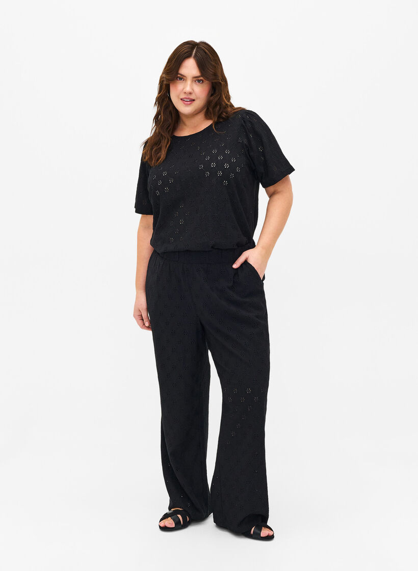 Pantalon ample avec motif à trou, Black, Model image number 0