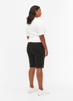 Shorts met strakke pasvorm en achterzakken, Black, Model image number 1