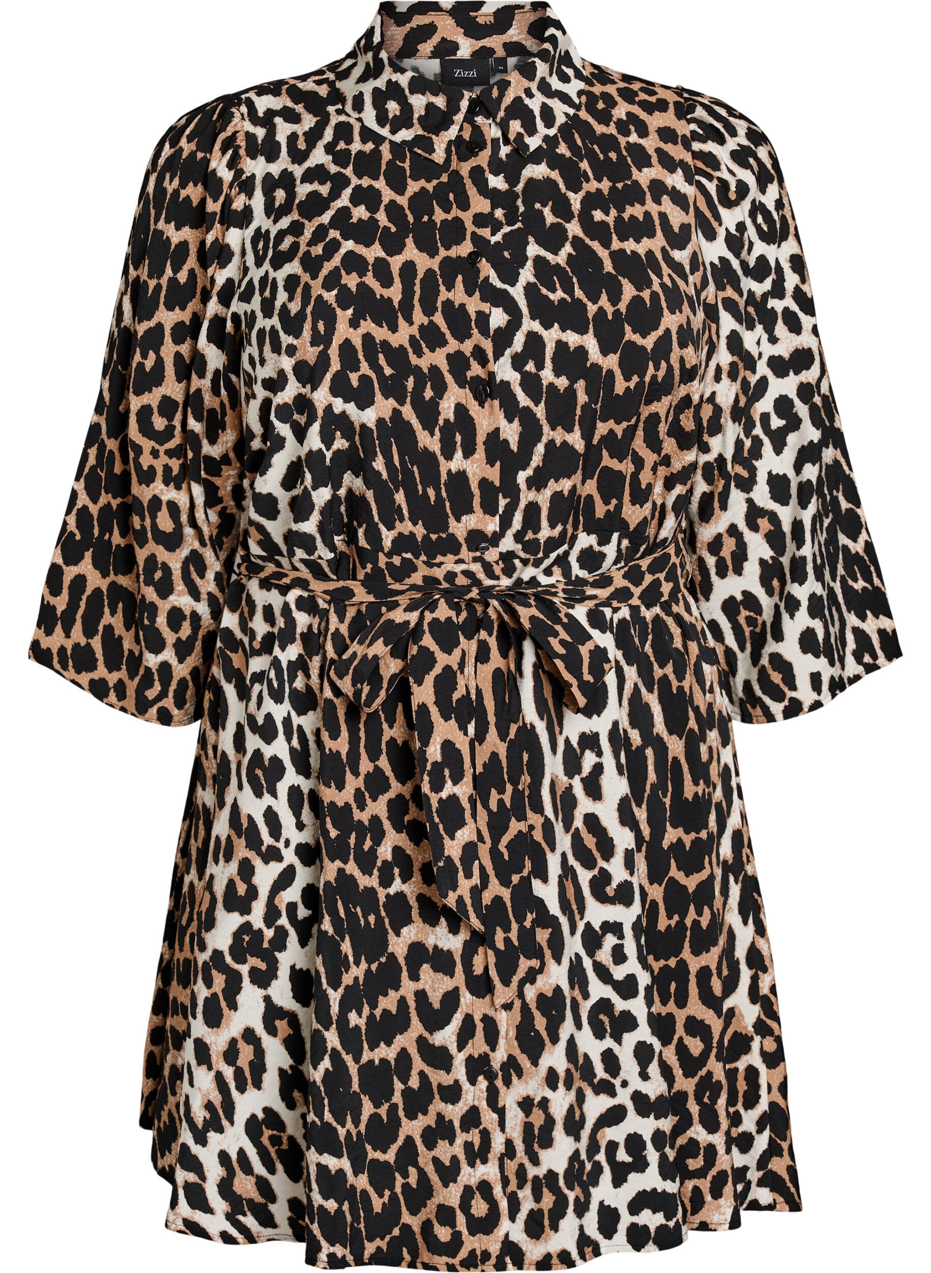 Getailleerde tuniek met een strikceintuur en 3/4 mouwen.