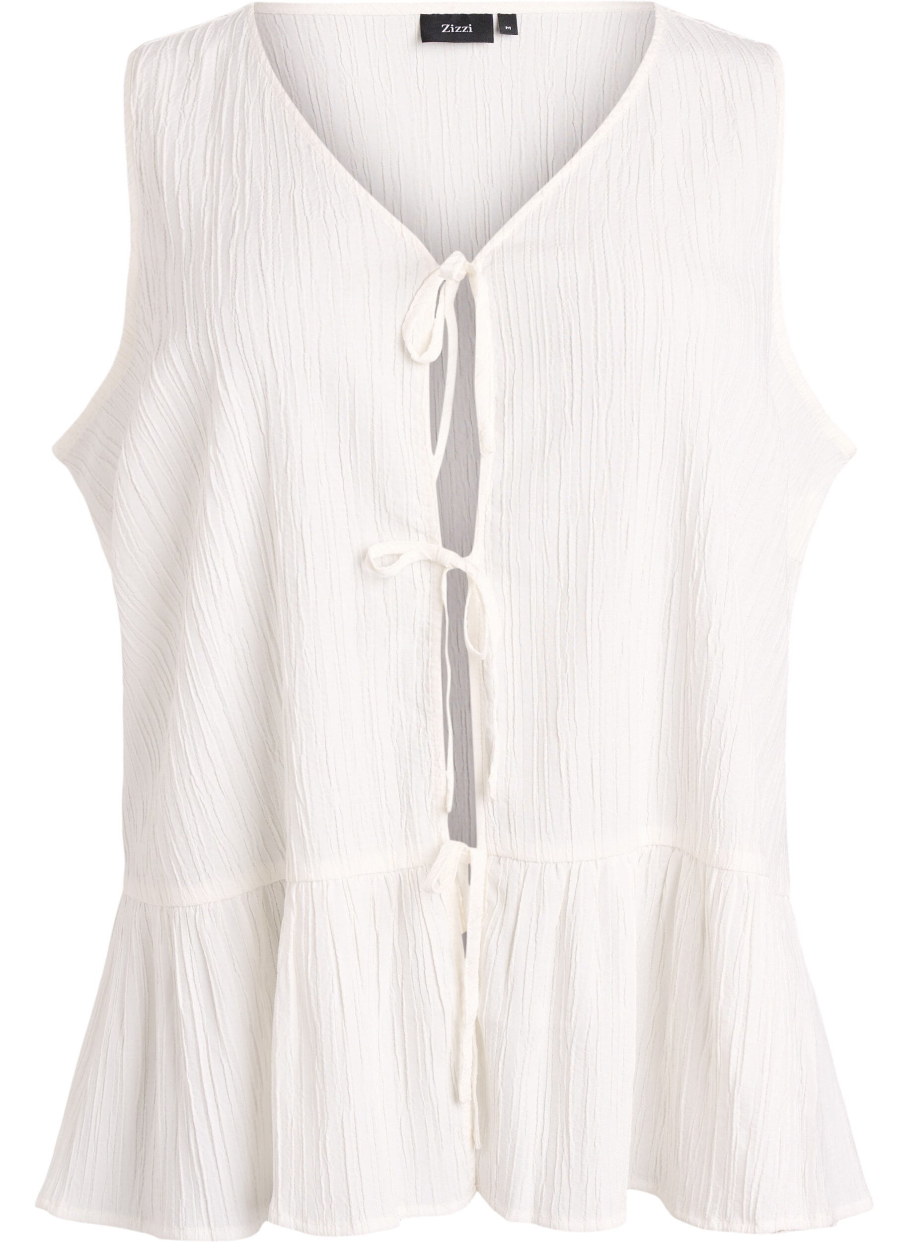 Mouwloze blouse met textuur en een striksluiting