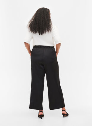 Pantalon ample avec poches et bord élastiqué, Black, Model image number 1