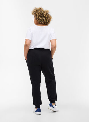 Pantalon de jogging ample avec poches, Black, Model image number 1