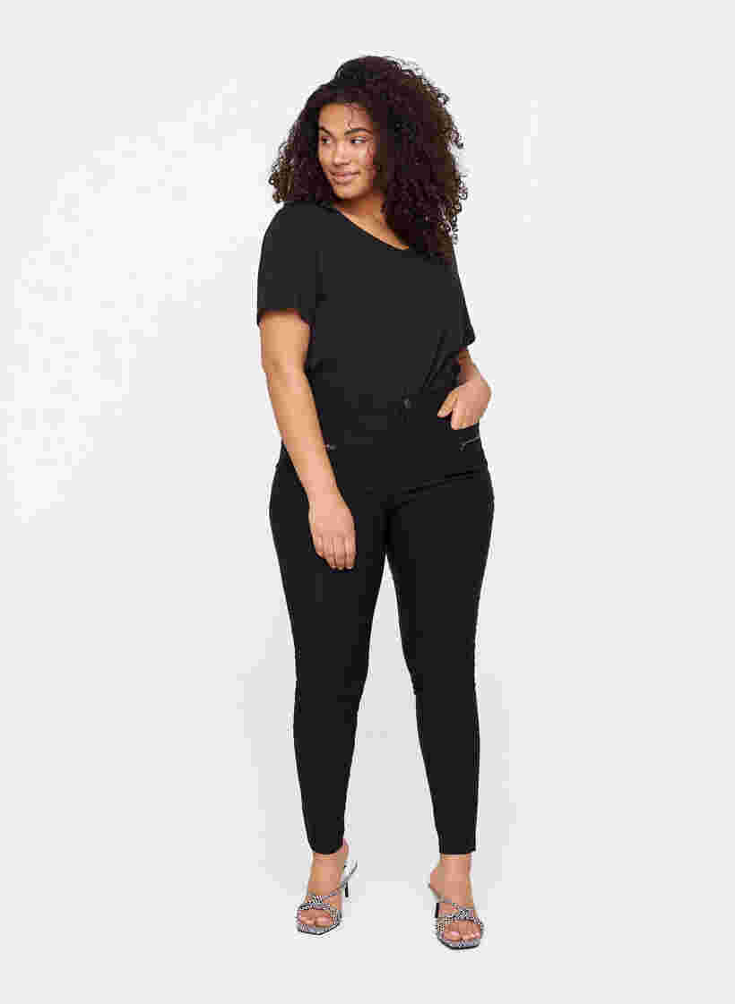 Nauwsluitende broek met rits details, Black, Model image number 0
