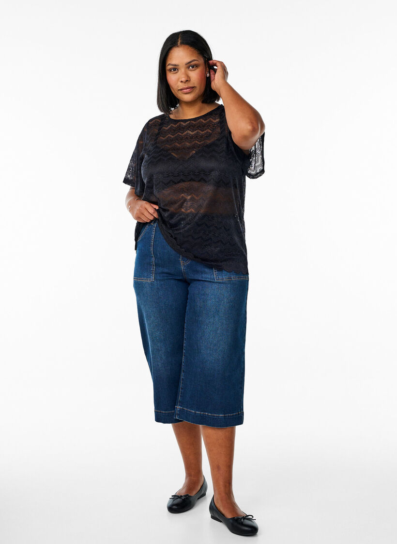 Chemisier en dentelle à manches courtes et ourlet échancré, Noir, Model image number 1