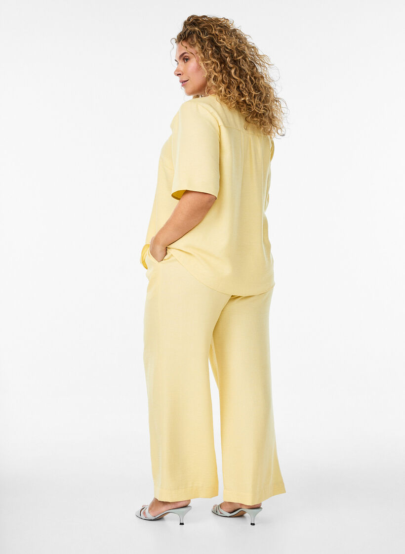 Losse broek met elastische tailleband en zakken, Geel, Model image number 1