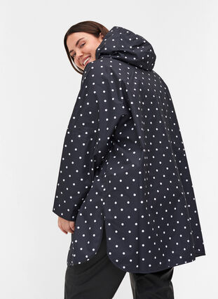 Poncho de pluie avec capuche et imprimé, Black w/ white dots, Model image number 1