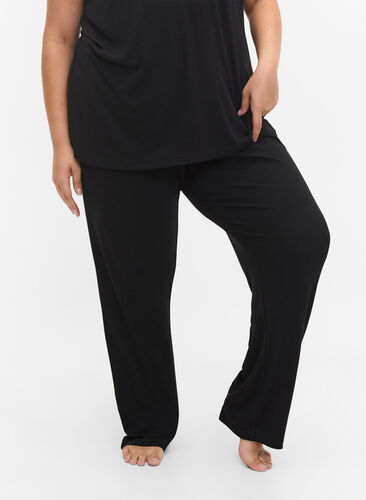 Losse pyjama broek in viscose, Black, Model image number 1
