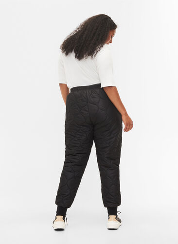 Pantalon thermique matelassé, Black, Model image number 1