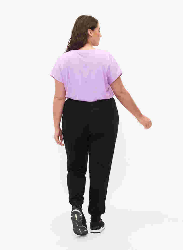 Pantalon de sport ample avec des poches, Black, Model image number 1