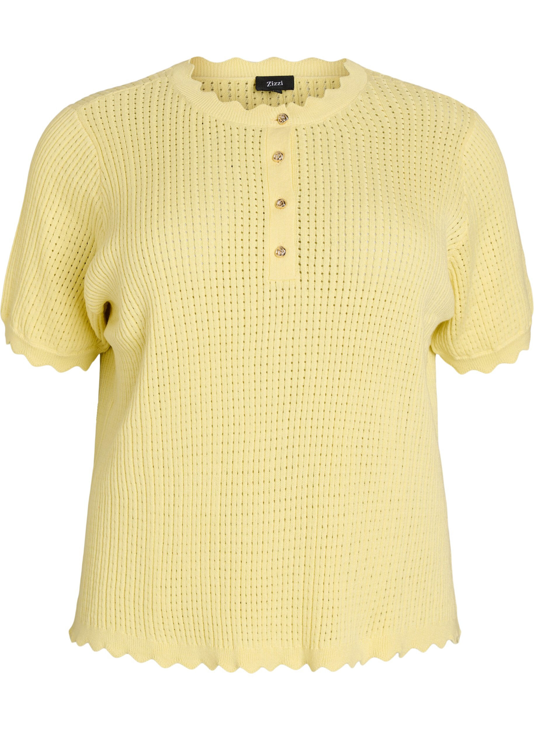 Korte mouw gebreide blouse met ajourpatroon en golfranden