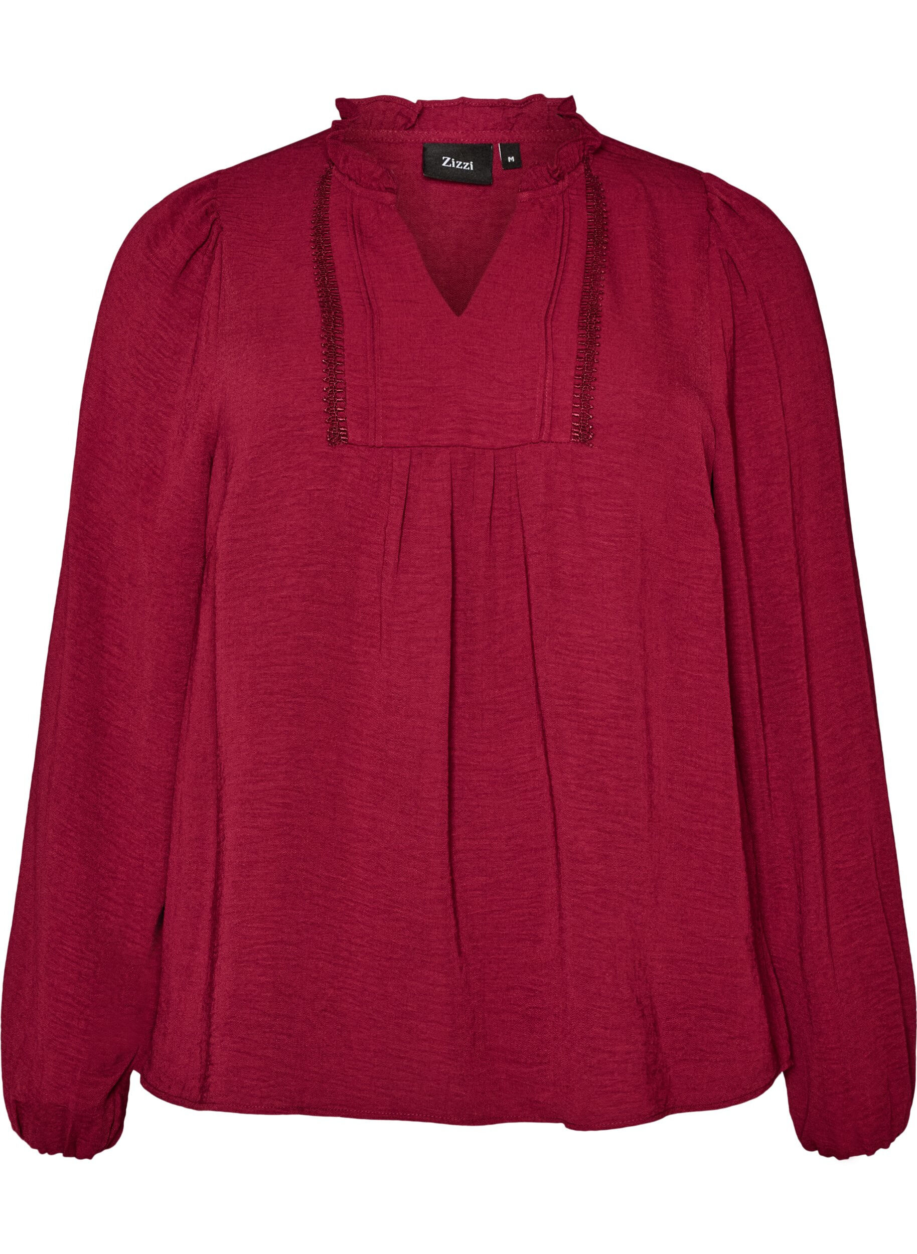 Blouse met V-hals en gehaakte sierband