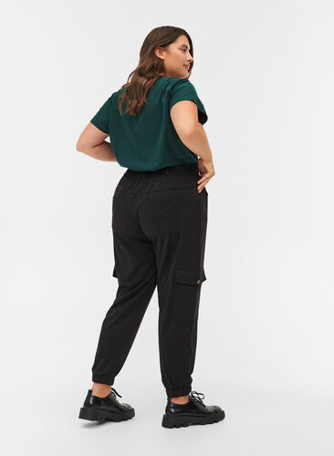 Pantalon ample avec bord élastique et poches, Black, Model image number 1
