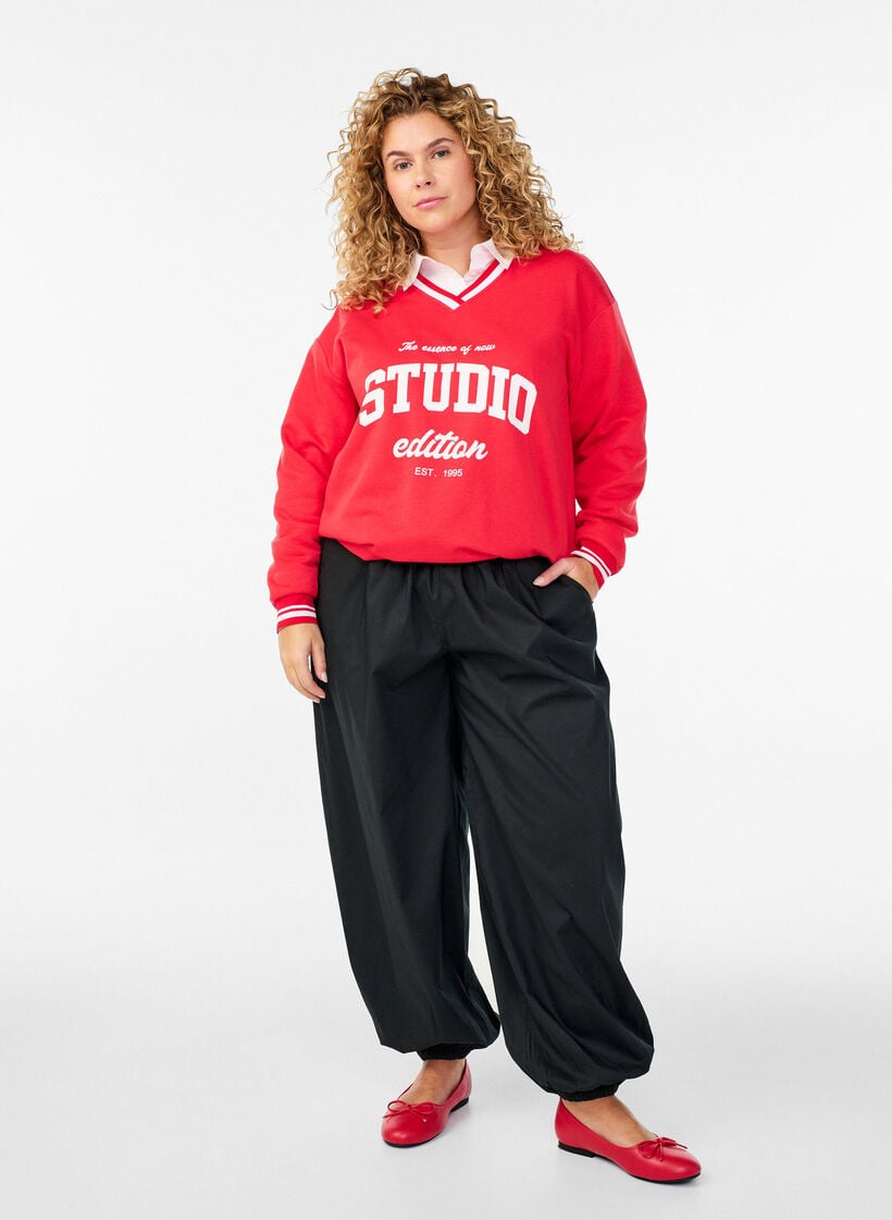 Ballonbroek met zakken en een elastische tailleband, Zwart, Model image number 1