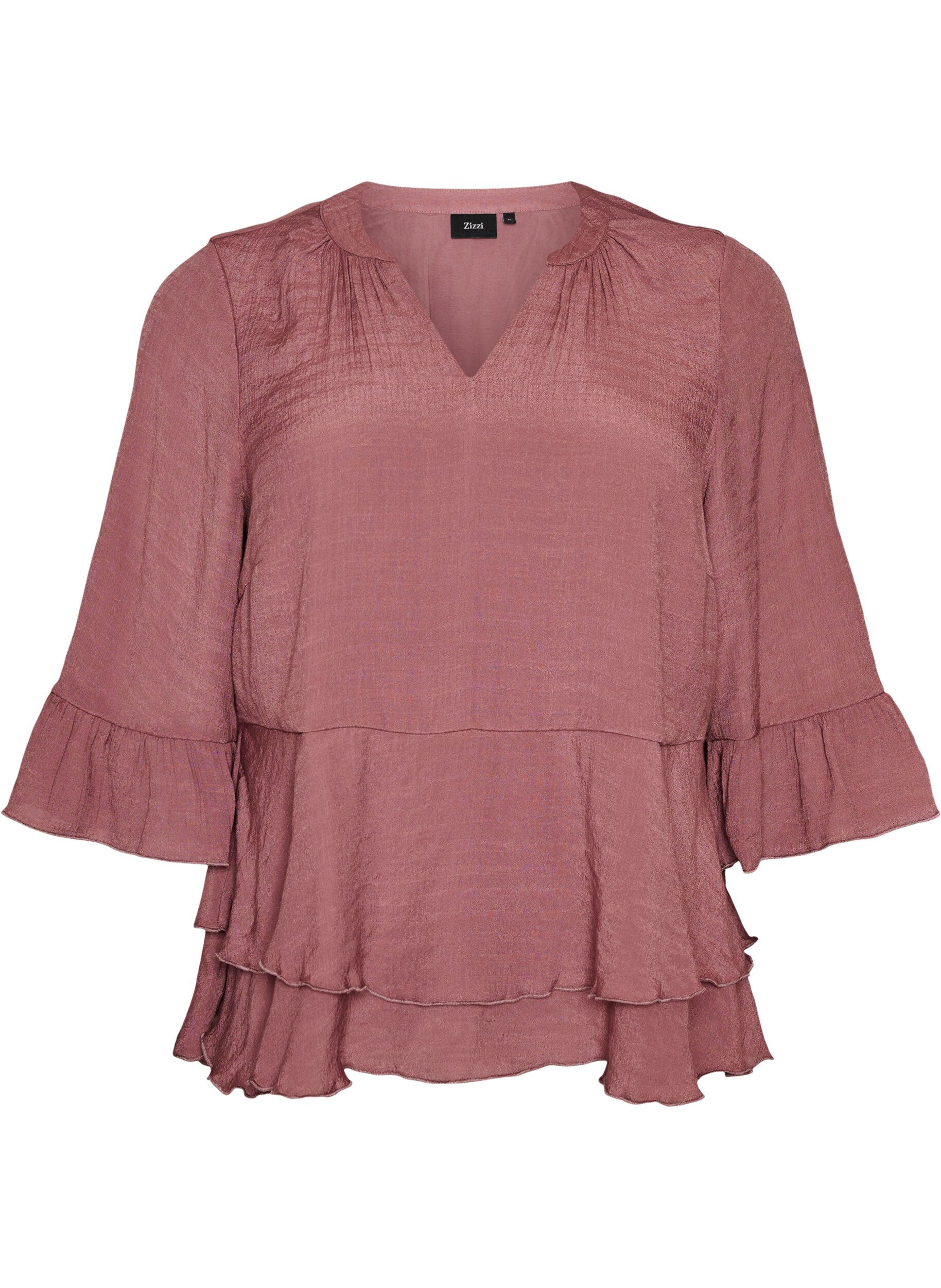 Blouse &agrave; manches 3/4 et volants
