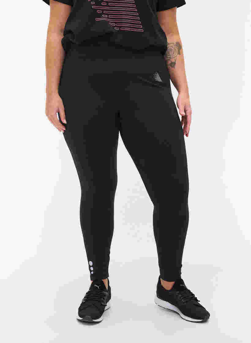 Cropped sportlegging met zakje en reflecterend, Black, Model image number 2
