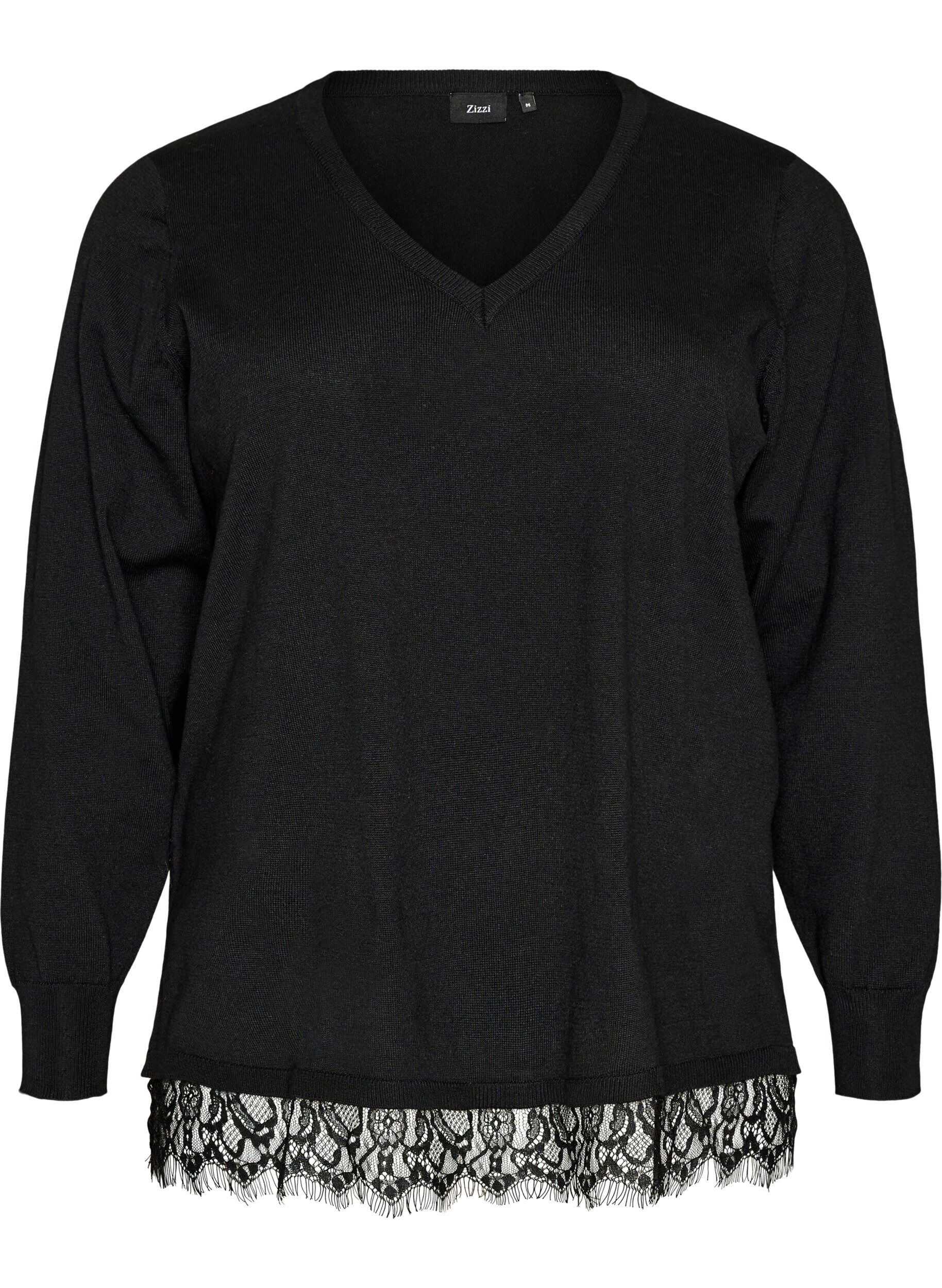 Blouse en maille avec col en V et finitions en dentelle