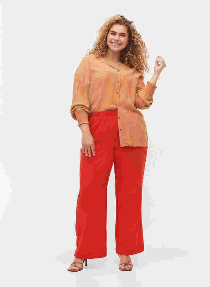 Flared broek met elastiek in de taille, Fiery Red, Model image number 0