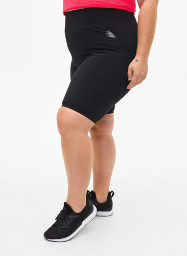 Nauwsluitende training shorts met zak, Black, Model image number 0